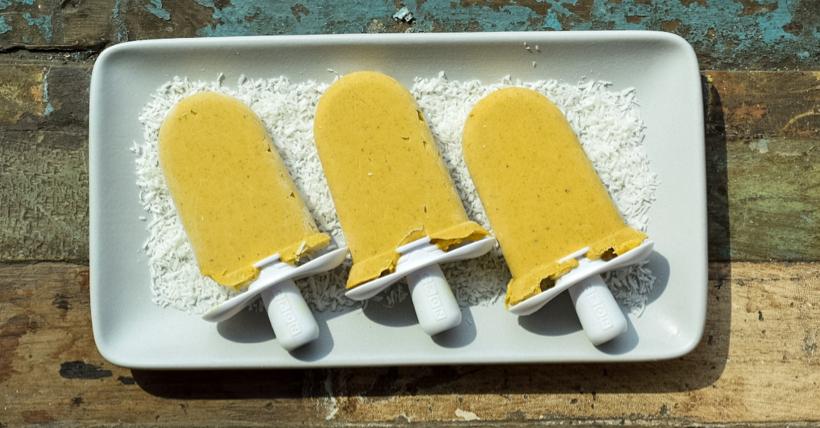 Creamy Tropical Turmeric Paletas on tray