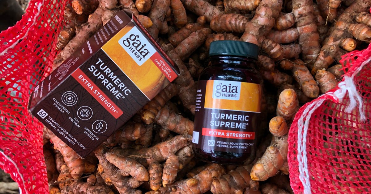 Gaia Herbs Turmeric products on a pile of turmeric root