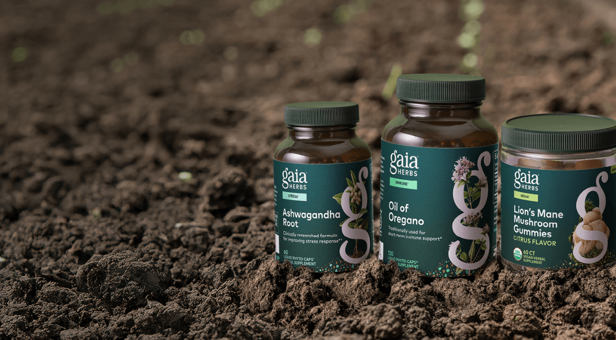 Gaia Herbs products in a field of soil