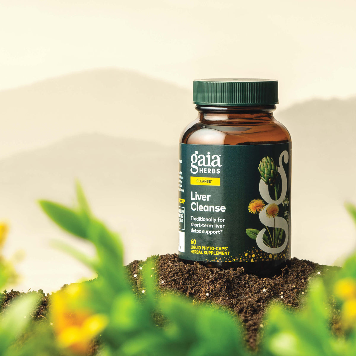 Gaia Herbs Liver Cleanse 60 count supplement bottle on a natural background with plants and flowers.