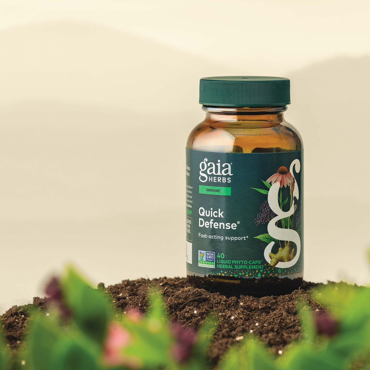 Gaia Herbs Quick Defense 40 count supplement bottle on a natural background with plants.