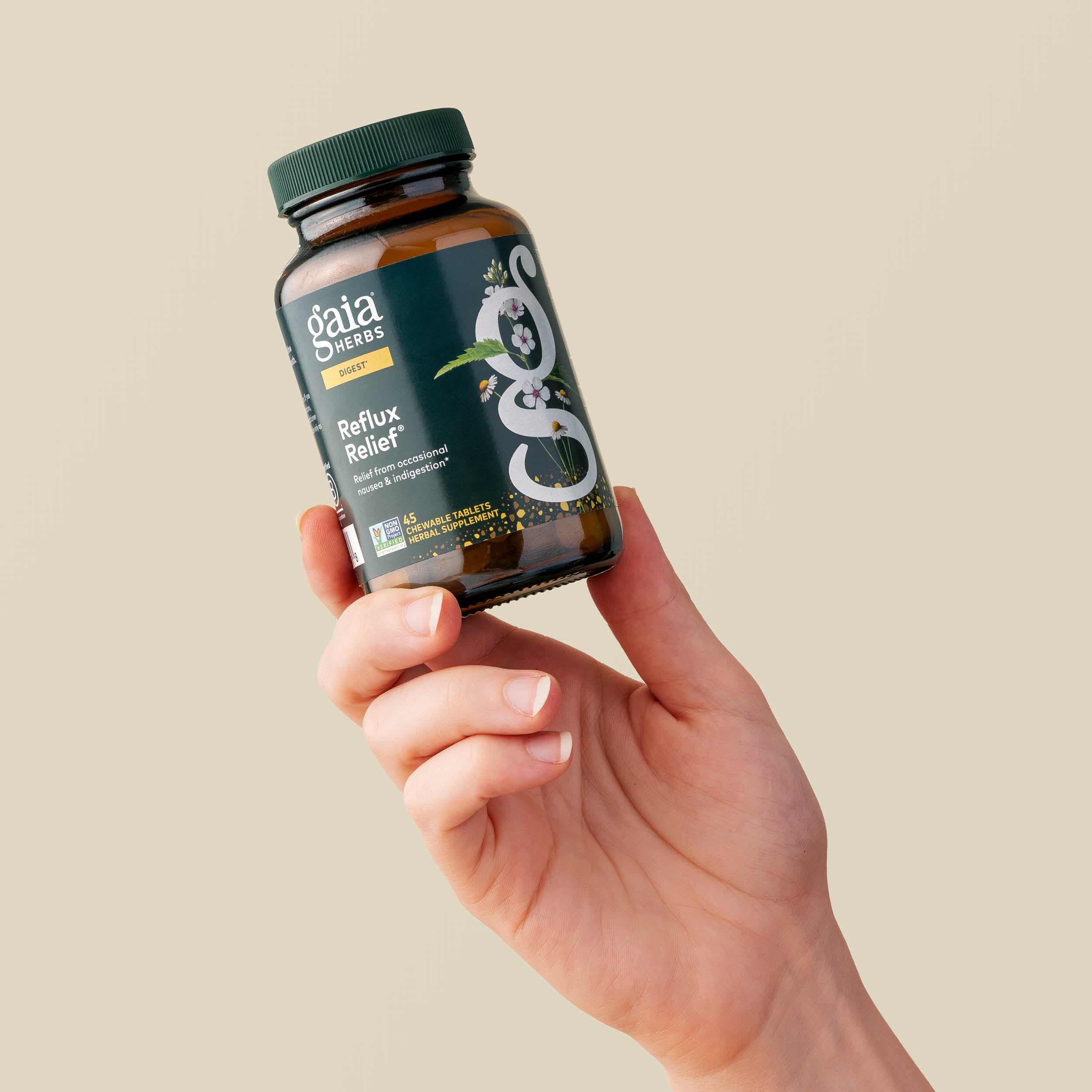 Reflux Relief 45 Count Bottle Held In A Person's Hand