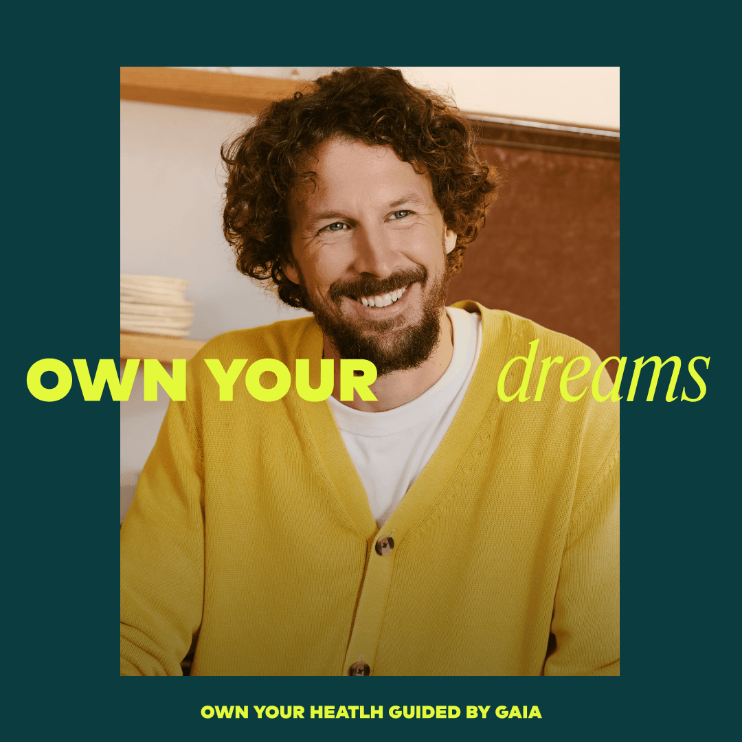 A motivational graphic with a photo of a smiling man in a yellow sweater, overlaid with the text 'OWN YOUR dreams' in bright yellow-green lettering. The image has a dark teal border and additional text at the bottom reading 'OWN YOUR HEALTH GUIDED BY GAIA'.