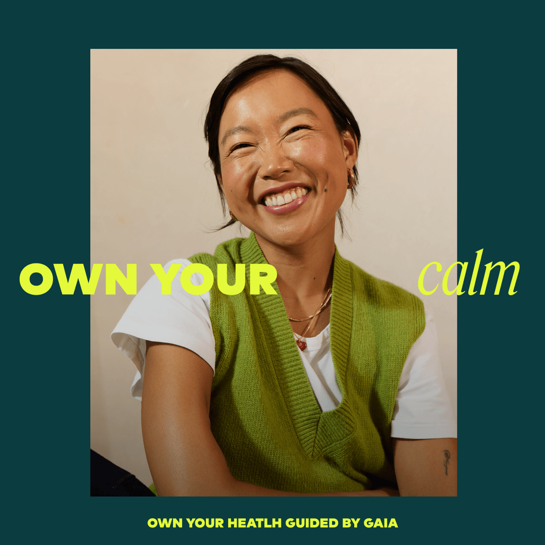 A smiling woman in a green knit vest over a white T-shirt is shown in a square portrait centered on a dark teal background with large yellow text reading 'OWN YOUR calm' and smaller text at the bottom reading 'OWN YOUR HEALTH GUIDED BY GAIA'.